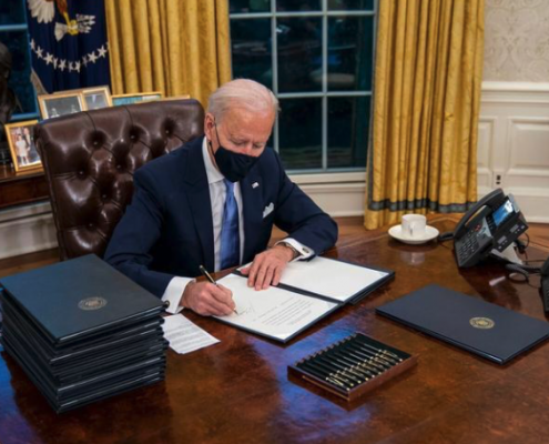 President Biden signs an executive order on the Paris climate agreement